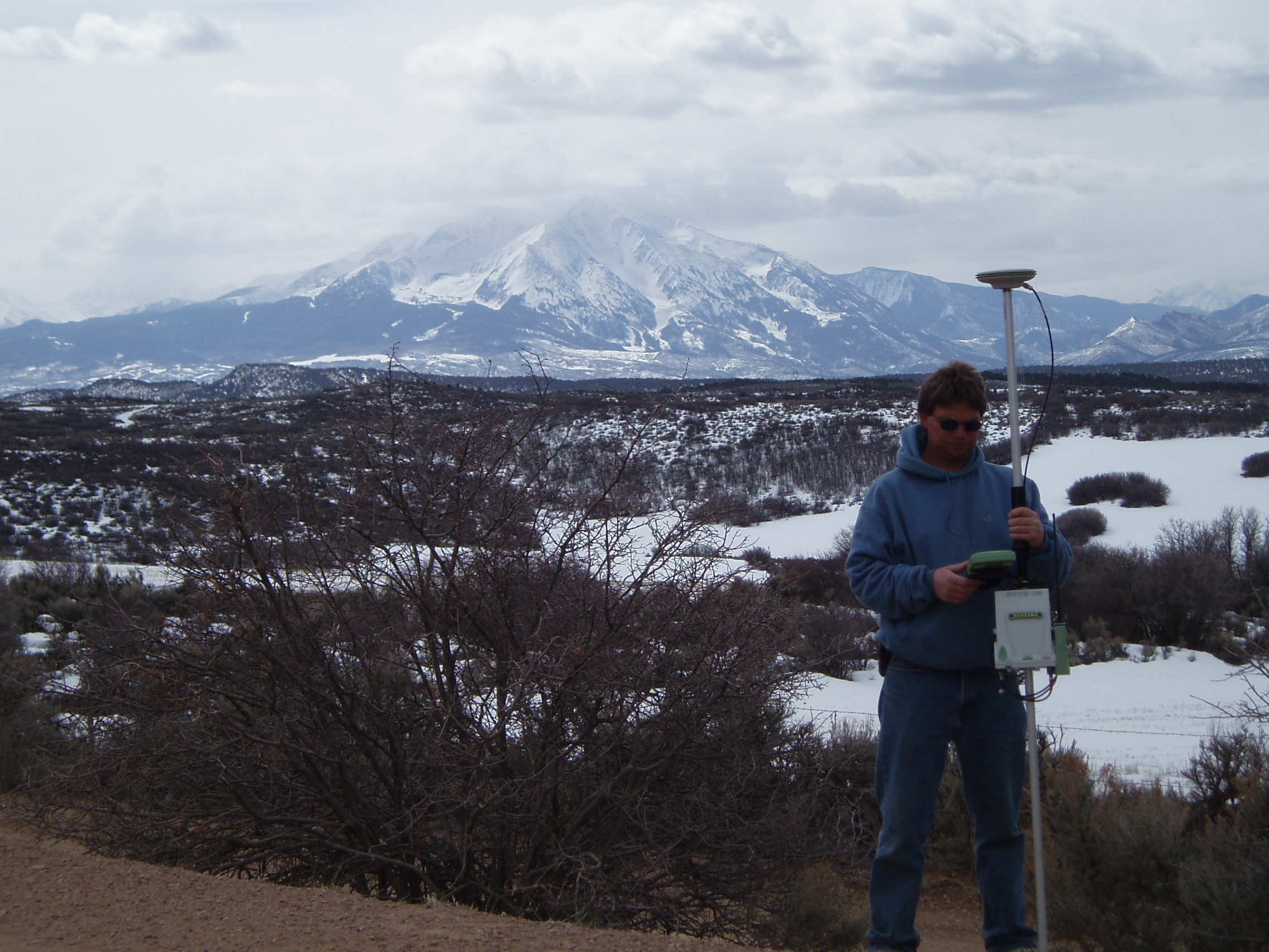 Surveyor using rover.